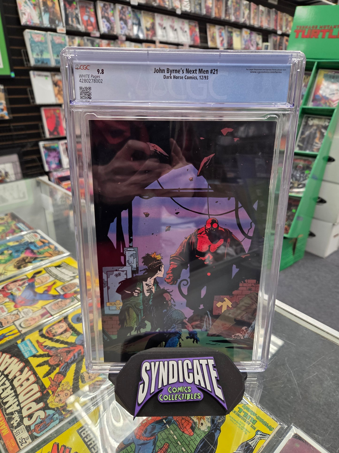 John Byrne's Next Men #21 (CGC 9.8) 1st Hellboy in Color